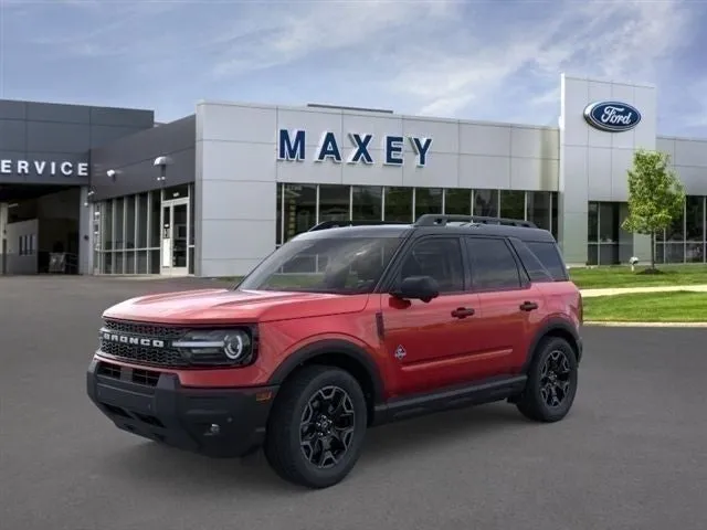 2026 Ford Bronco Sport Outer Banks® in Ruby Red Metallic Tinted Clearcoat — front three-quarter view