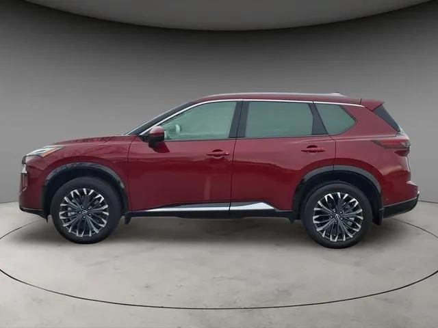 2025 Nissan Rogue Platinum in Scarlet Ember Tintcoat — front three-quarter view