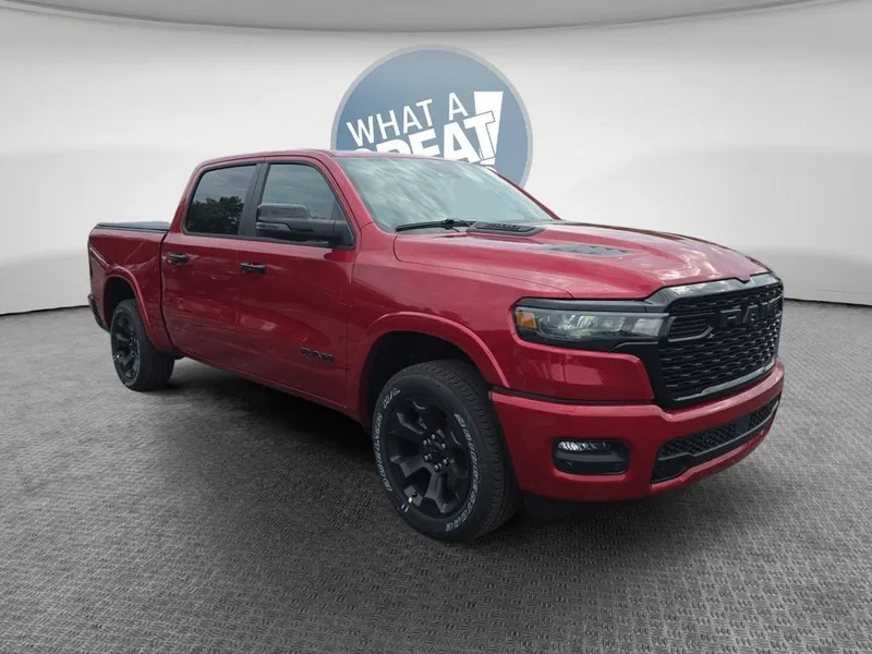 2026 RAM 1500 Big Horn/Lone Star in Molten Red Pearlcoat — front three-quarter view