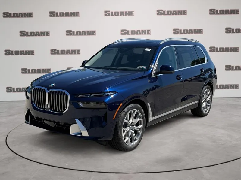 2027 BMW X7 xDrive40i in Tanzanite Blue II Metallic — front three-quarter view