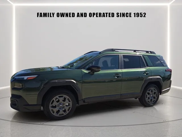 2026 Subaru Outback Premium in Deep Emerald Green Pearl — front three-quarter view