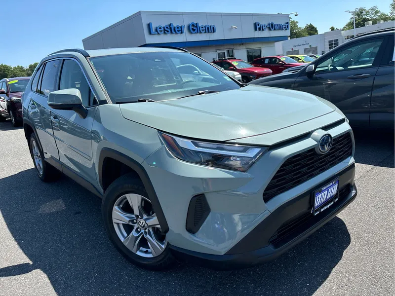 2023 Toyota RAV4 Hybrid XLE in Lunar Rock — front three-quarter view