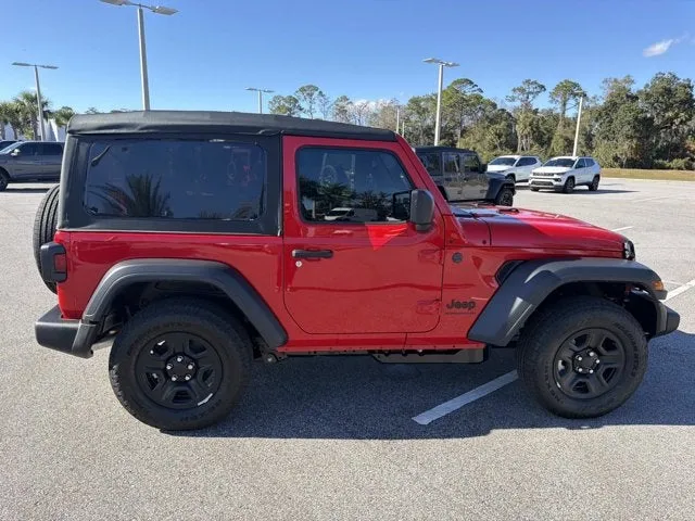 2026 Jeep Wrangler Sport in Firecracker Red Clearcoat — front three-quarter view