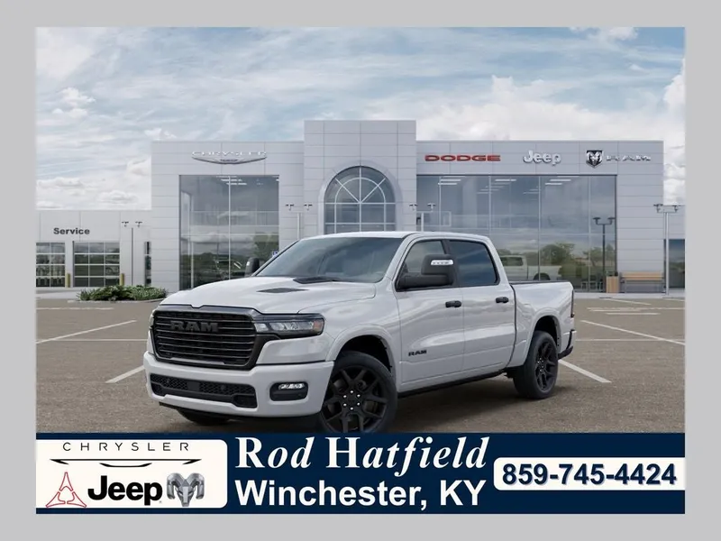 2026 RAM Ram 1500 RAM 1500 LARAMIE CREW CAB 4X4 5'7' BOX in Bright White Clear-Coat Exterior Paint — front three-quarter view