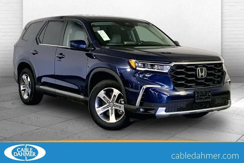 2025 Honda Pilot EX-L in Obsidian Blue Pearl — front three-quarter view