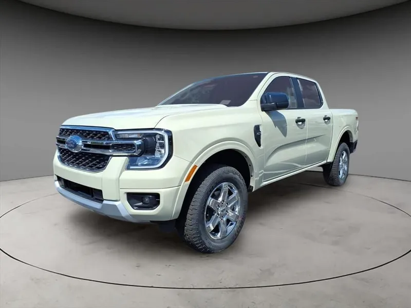2025 Ford Ranger XLT in Desert Sand — front three-quarter view