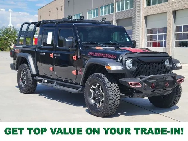 2023 Jeep Gladiator Rubicon in Black Clearcoat — front three-quarter view