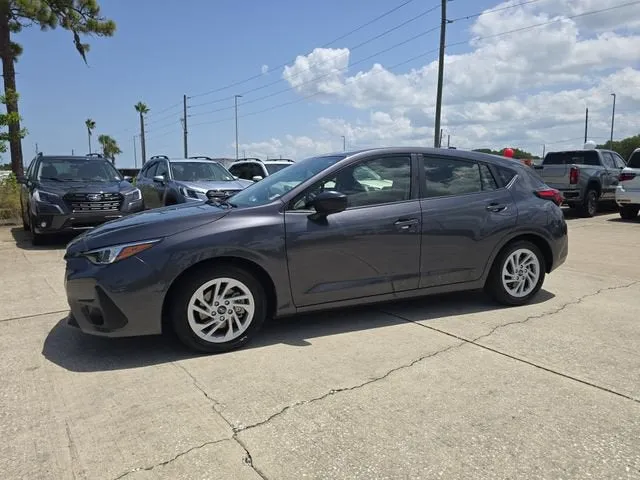 2024 Subaru Impreza Base in Magnetite Gray Metallic — front three-quarter view