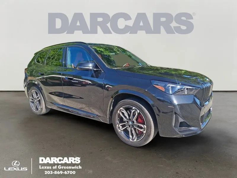2026 BMW X1 M35i in Black Sapphire Metallic — front three-quarter view