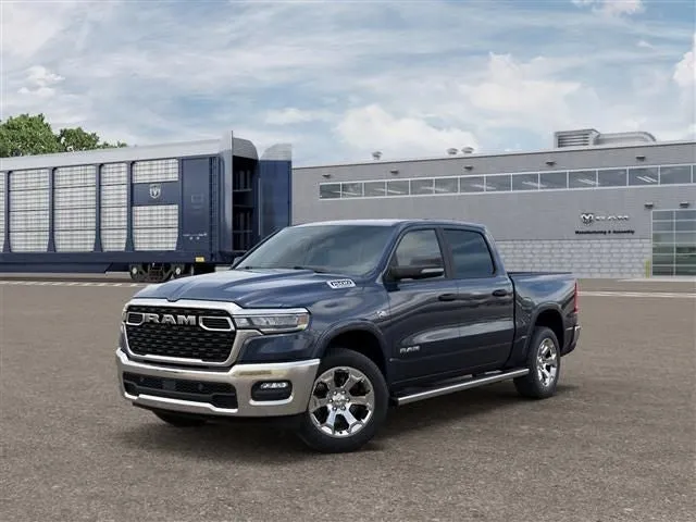 2026 RAM Ram 1500 RAM 1500 BIG HORN CREW CAB 4X4 5'7' BOX in Forged Blue Metallic Exterior Paint — front three-quarter view