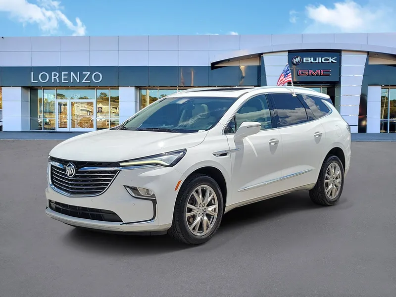 2024 Buick Enclave Essence in Summit White — front three-quarter view