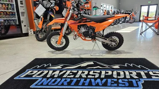 2027 KTM 50 SX — front three-quarter view