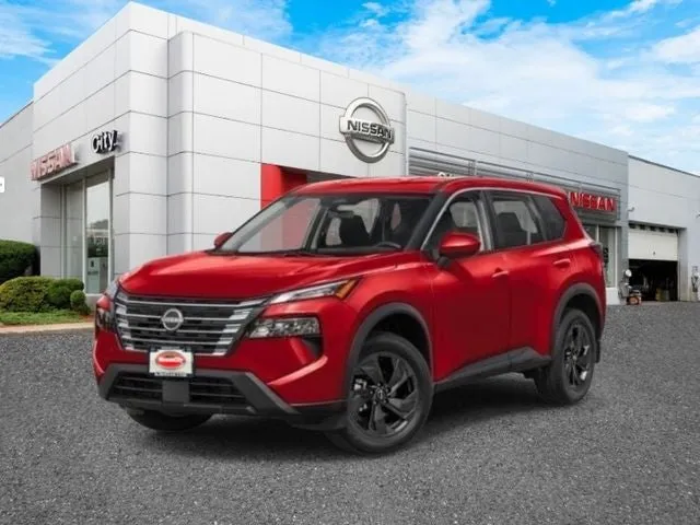 2026 Nissan Rogue SV in Scarlet Ember Tintcoat — front three-quarter view