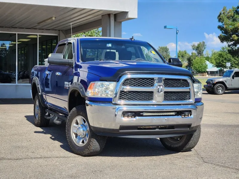 2014 RAM 2500 SLT in Blue Streak Pearlcoat — front three-quarter view
