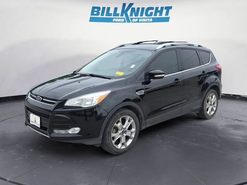 2016 Ford Escape Titanium in Shadow Black — front three-quarter view