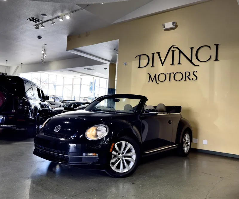2014 Volkswagen Beetle Convertible in Black — front three-quarter view