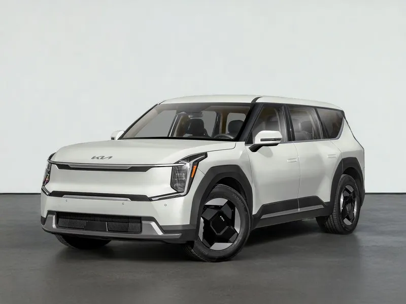 2024 Kia EV9 LAND in Ivory Silver — front three-quarter view