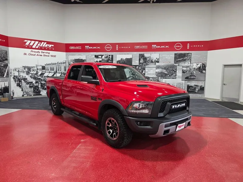 2016 RAM 1500 Rebel in Flame Red Clearcoat — front three-quarter view