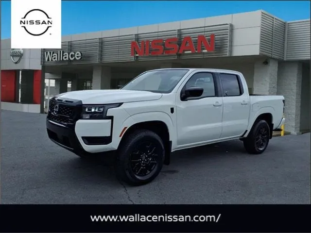 2026 Nissan Frontier SV in Glacier White Qak — front three-quarter view