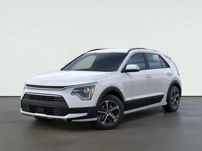 2026 Kia NIRO EX in Snow White Pearl — front three-quarter view