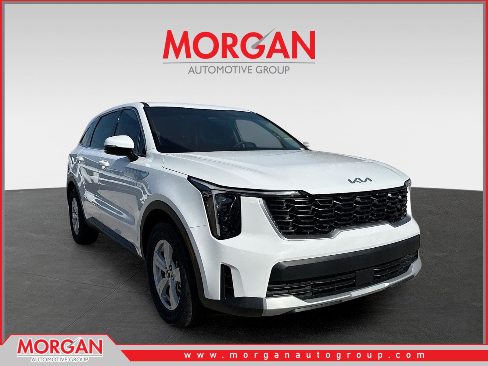 2026 Kia Sorento LX in Glacial White Pearl — front three-quarter view