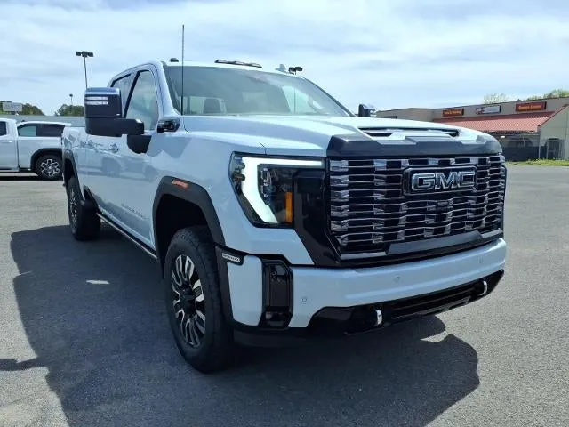 2026 GMC Sierra 2500 HD Denali Ultimate in Glacier White Tricoat — front three-quarter view