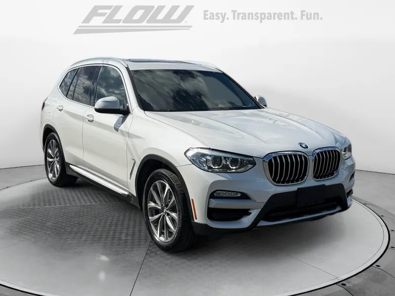 2019 BMW X3 xDrive30i in Mineral White Metallic — front three-quarter view