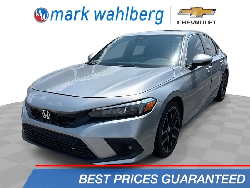 2023 Honda Civic Hatchback Sport Touring in Lunar Silver Metallic — front three-quarter view