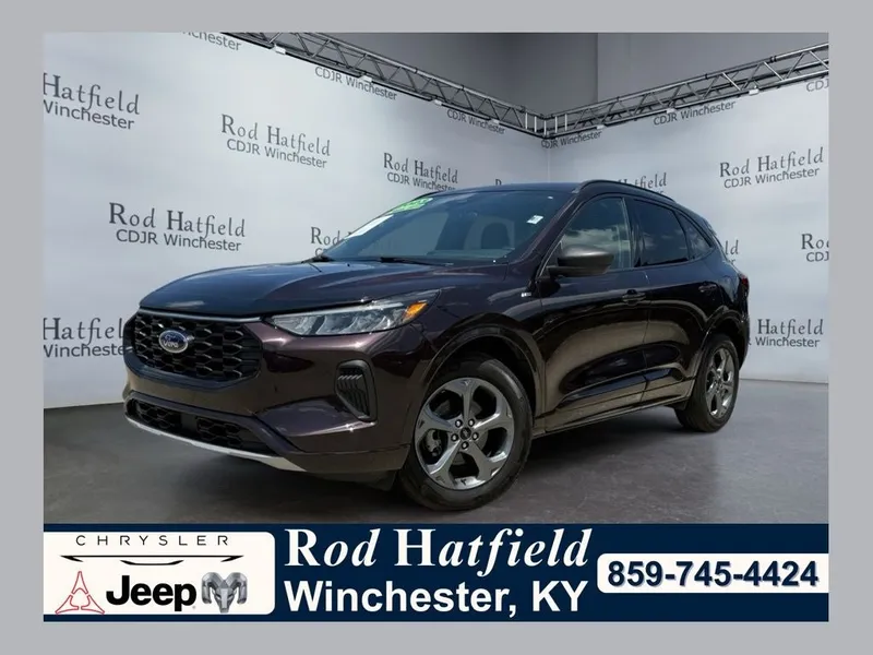 2023 Ford Escape ST-Line in Cinnabar Red Metallic Premium Colorant — front three-quarter view