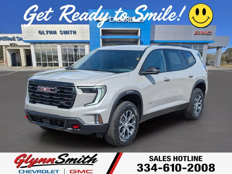 2026 GMC Acadia AT4 in Riverstone Metallic — front three-quarter view