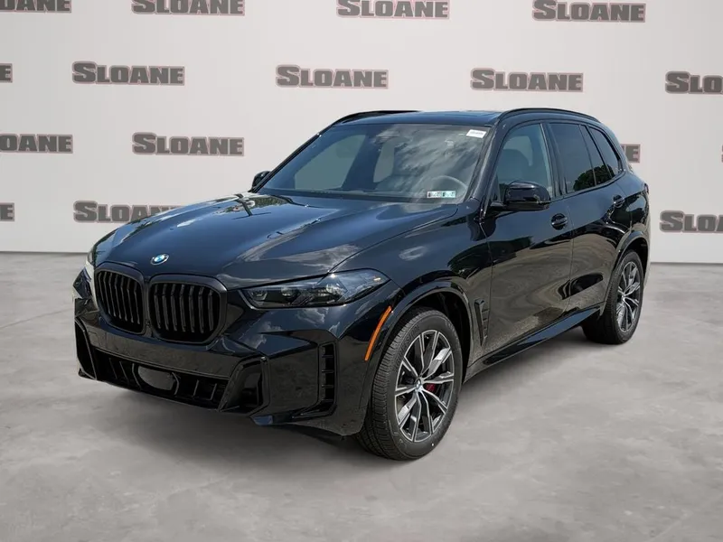 2026 BMW X5 xDrive40i in Black Sapphire Metallic — front three-quarter view