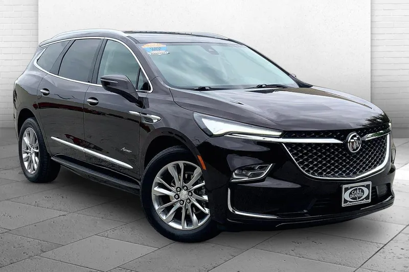 2022 Buick Enclave Avenir in Rich Garnet Metallic — front three-quarter view