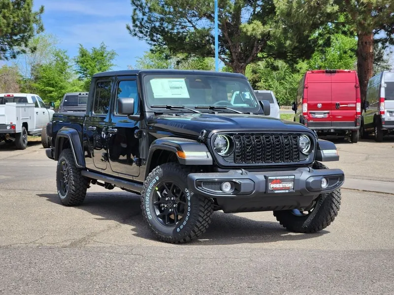 2026 Jeep Gladiator GLADIATOR WILLYS 4X4 in Black Clear-Coat Exterior Paint — front three-quarter view