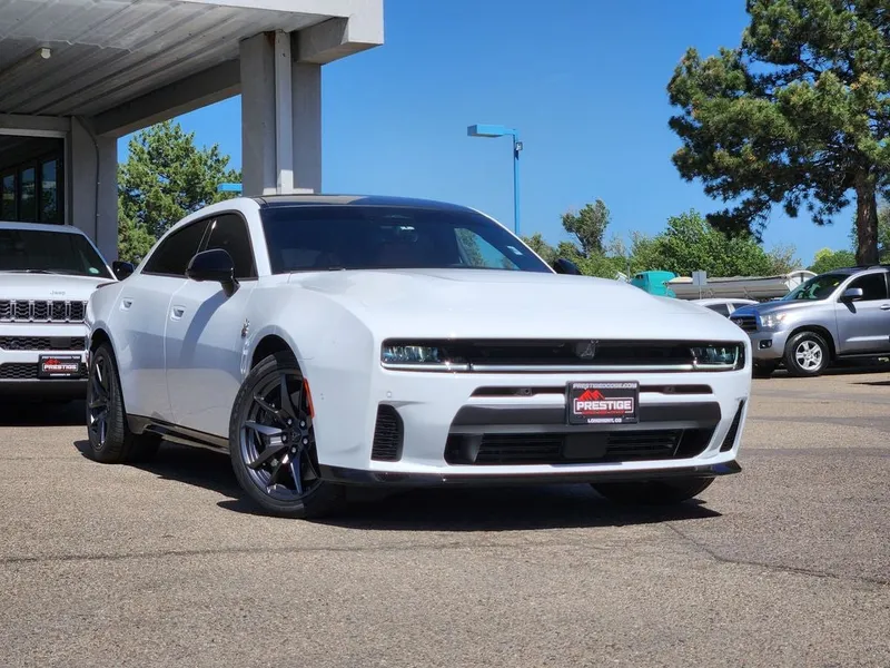 2026 Dodge Charger CHARGER SCAT PACK PLUS 4-DOOR AWD in White Knuckle — front three-quarter view