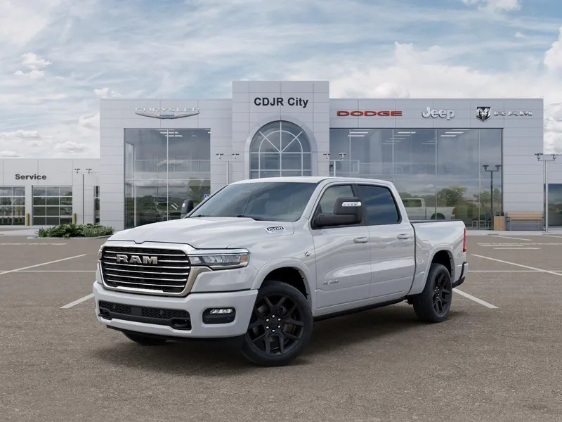 2026 RAM Ram 1500 RAM 1500 LARAMIE CREW CAB 4X4 5'7' BOX in Bright White Clear-Coat Exterior Paint — front three-quarter view