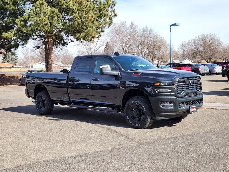 2026 RAM 3500 RAM 3500 TRADESMAN CREW CAB 4X4 8' BOX in Forged Blue Metallic Exterior Paint — front three-quarter view