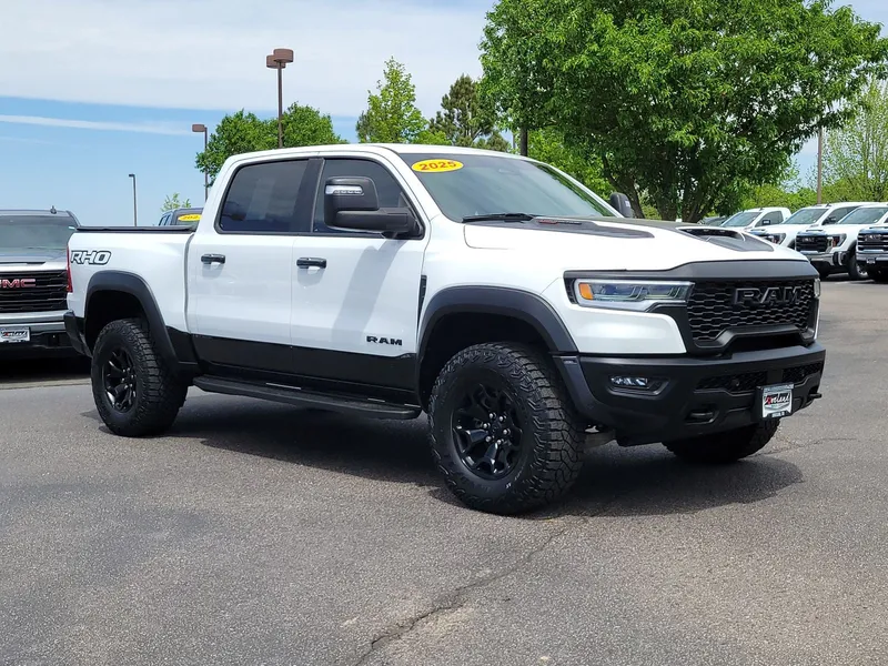 2025 RAM 1500 RHO in Bright White Clearcoat — front three-quarter view