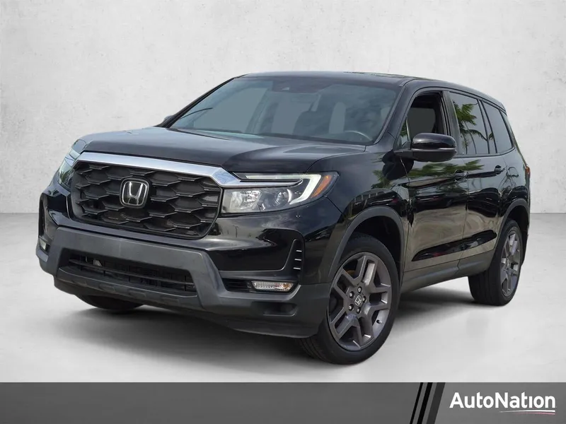 2023 Honda Passport EX-L AWD in Crystal Black Pearl — front three-quarter view