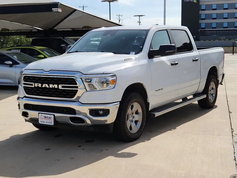 2024 RAM 1500 Big Horn/Lone Star in Bright White Clearcoat — front three-quarter view