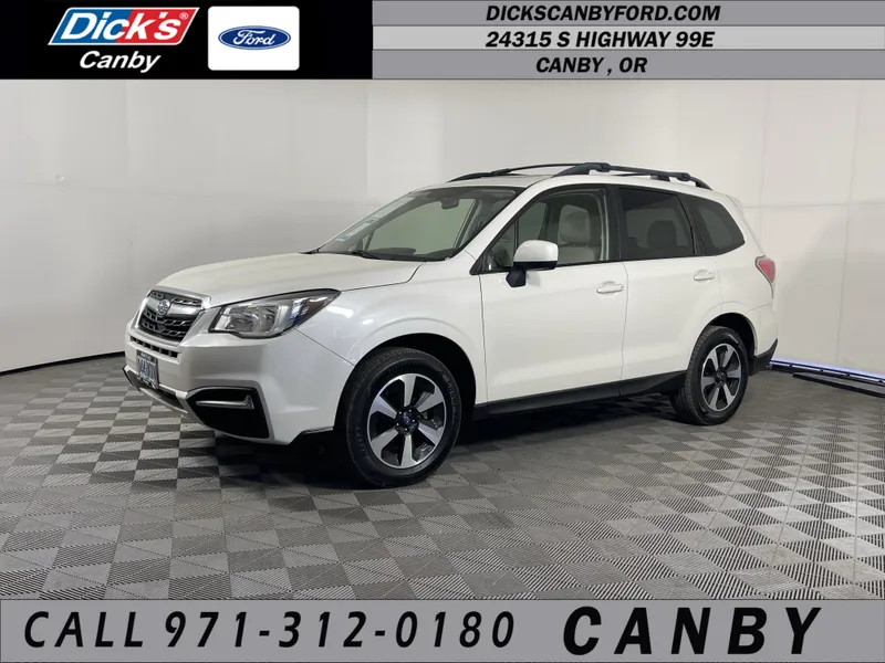 2017 Subaru Forester Premium in Crystal White Pearl — front three-quarter view