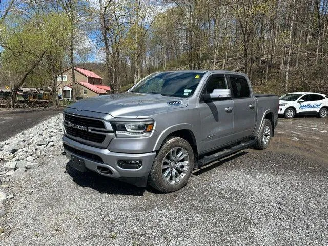 2021 RAM 1500 Laramie Crew Cab 4x4 5'7" Box in Silver — front three-quarter view