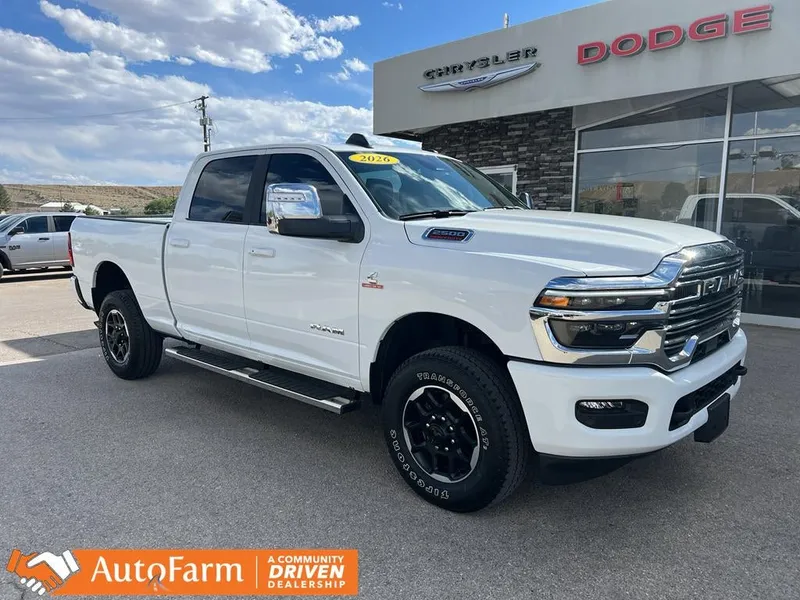 2026 RAM 2500 Laramie in Bright White Clearcoat — front three-quarter view