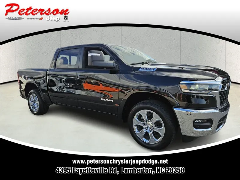 2026 RAM Ram 1500 RAM 1500 BIG HORN CREW CAB 4X4 5'7' BOX in Diamond Black Crystal Pearl-Coat Exterior Paint — front three-quarter view