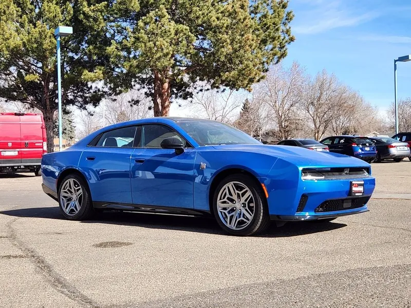 2026 Dodge Charger CHARGER DAYTONA SCAT PACK 4-DOOR AWD in Bludicrous Exterior Paint — front three-quarter view