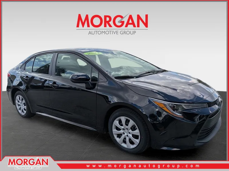 2024 Toyota Corolla LE in Midnight Black Metallic — front three-quarter view