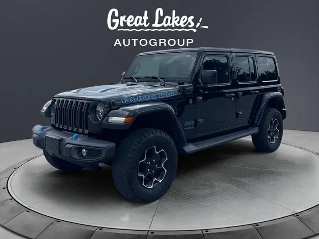 2021 Jeep Wrangler Unlimited Rubicon 4xe in Black Clearcoat — front three-quarter view