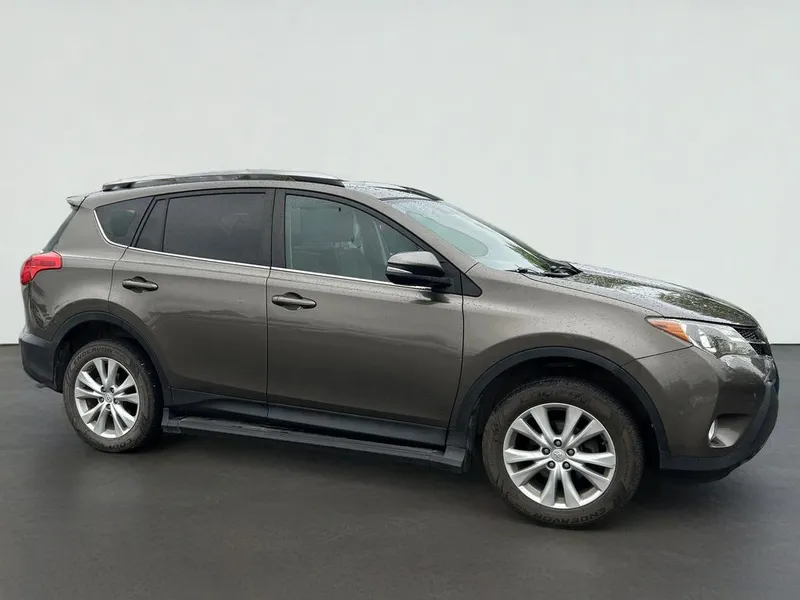 2015 Toyota Rav4 Limited in Brown — front three-quarter view