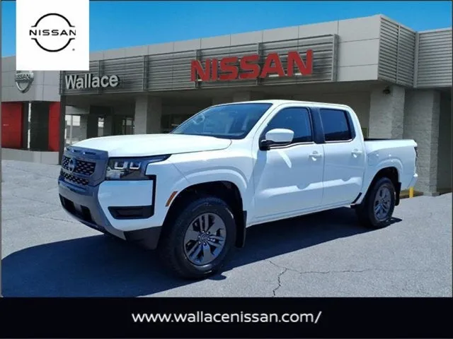 2026 Nissan Frontier SV in Glacier White Qak — front three-quarter view