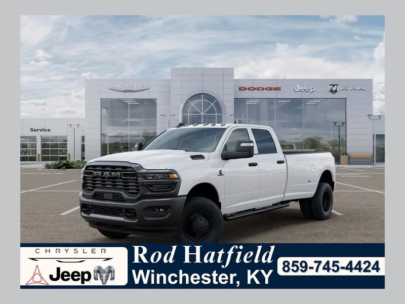 2026 RAM Ram 3500 RAM 3500 TRADESMAN CREW CAB 4X4 8' BOX in Bright White Clear-Coat Exterior Paint — front three-quarter view