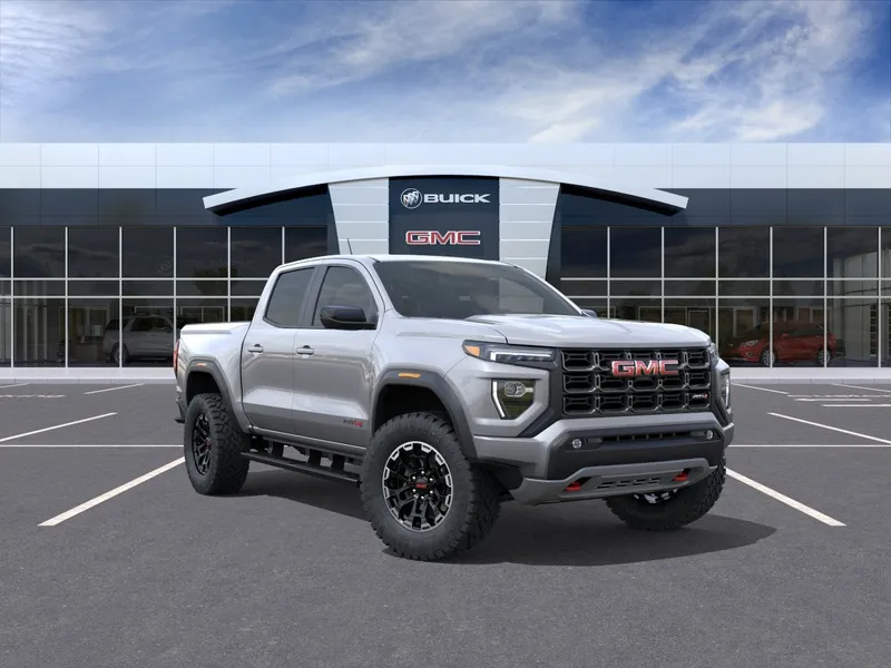 2026 GMC Canyon AT4 in Sterling Metallic — front three-quarter view
